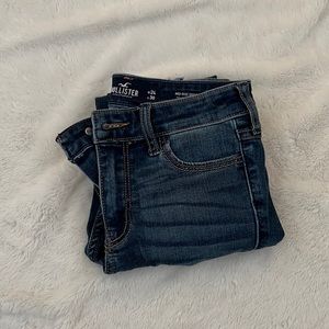 Hollister, medium wash skinny jeans with rips